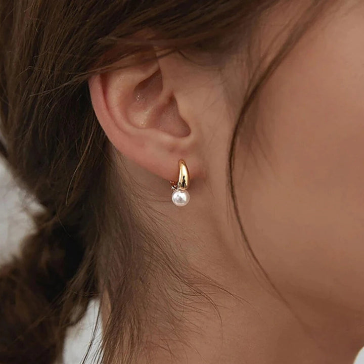 Elegant Golden Pearl Studs