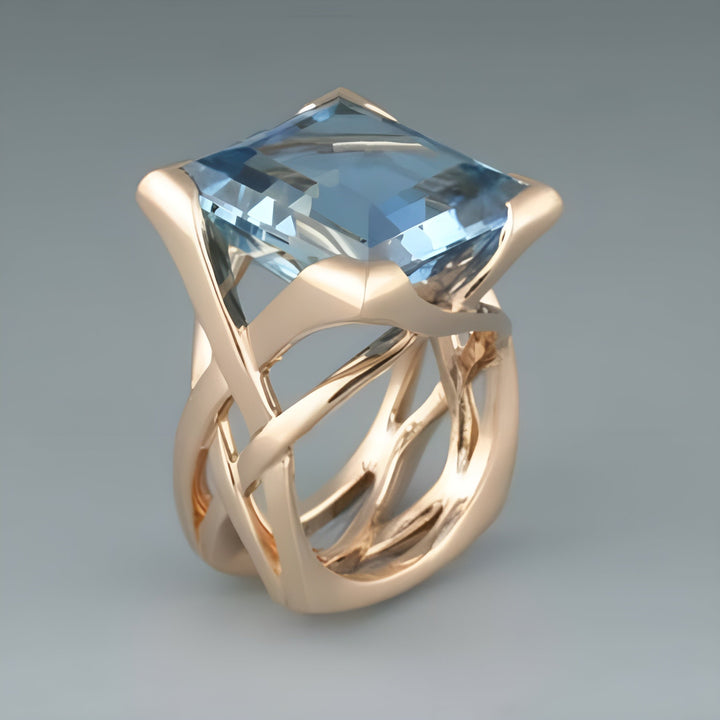 Vintage rose gold ring with blue zirconia